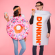 Man and woman in Dunkin' costumes